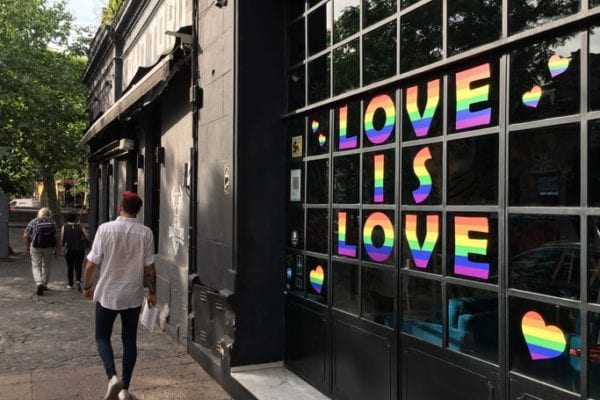 Love is love written on store window